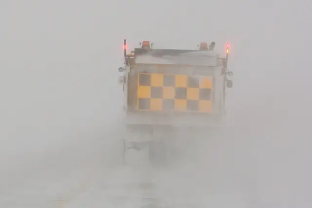 Snowplow in a blizzard
